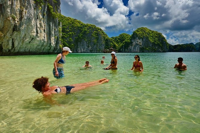 1 Day Boat Tour: HaLong Bay, Lan Ha Bay, Natural Beach and Full Moon Party - Exploring Floating Fishing Village