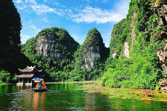 1 Day Luxury Ninh Binh Tour Bai Dinh and Trang An Boat Trip - Guide and Tour Highlights