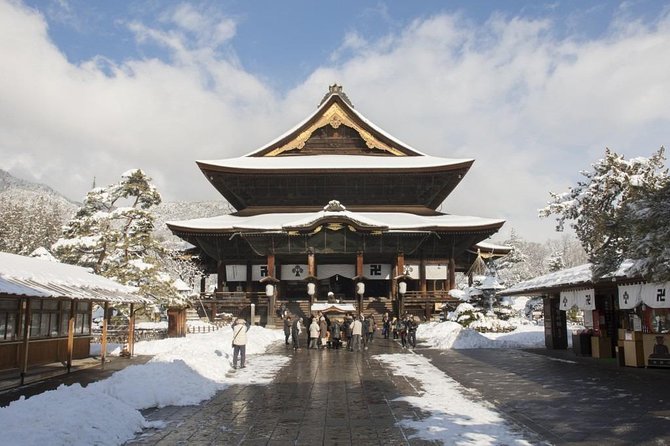 1-Day Winter Tour From Nozawa Onsen: Snow Monkeys, Zenko-ji Temple & Sake - Discovering Zenko-ji Temple