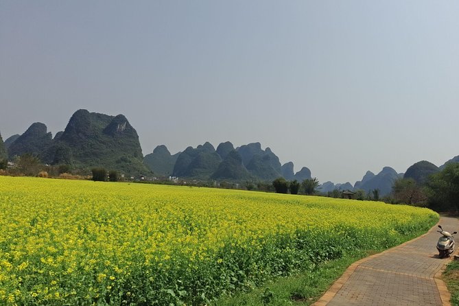 1 Day Yangshuo Private Day Tour With the Scooter - Cost and Inclusions