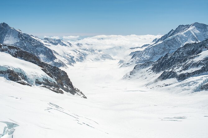 2-Day Jungfraujoch Top of Europe Tour From Lucerne: Interlaken or Grindelwald - Ascent to Jungfraujoch Peak