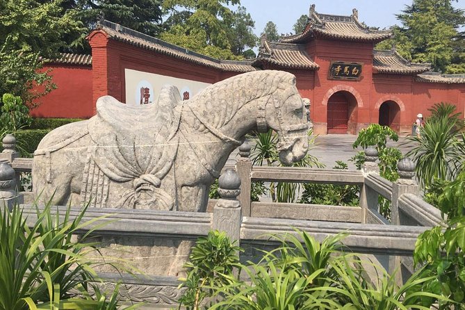 2-Day Luoyang Private Tour: Longmen Grottoes, White Horse Temple, Shaolin Temple - Longmen Grottoes Exploration