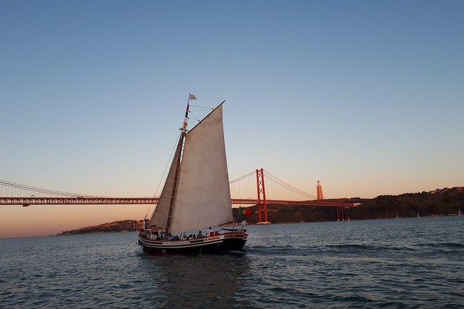 2-Hour Lisbon Traditional Boats Sunset Cruise With White Wine - Cruise Experience