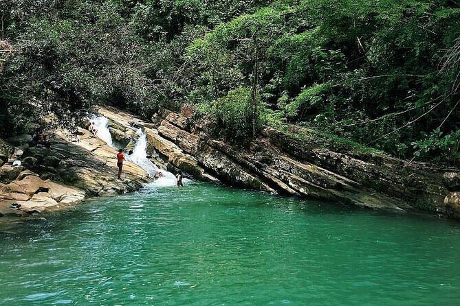 2 Tours in 1 Day: Rainforest Waterslides & Beach Tour w/Transport - Key Points