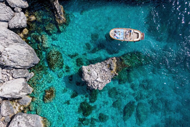 4 Hours Private Boat Tour of Capri - Onboard Amenities and Services