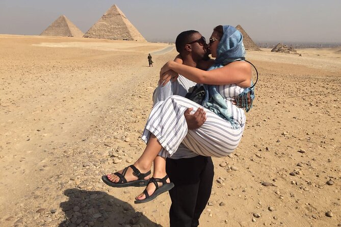 4-Hours Private Giza Pyramids,Sphinx ,lunch and Camel Ride - Admiring the Sphinx
