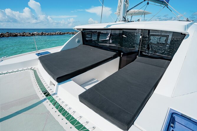 8-Hour Private 40 Catamaran 2Stop Tour to Cozumel Beach, Food, Drinks & Snorkel - Accessibility and Participation