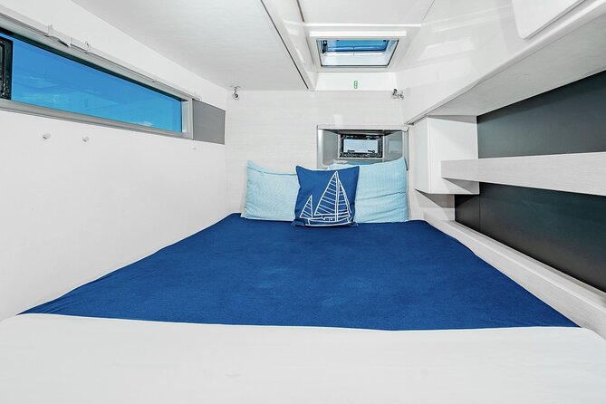 8-Hour Private 40 Catamaran 2Stop Tour to Cozumel Beach, Food, Drinks & Snorkel - Troll Fishing From the Catamaran