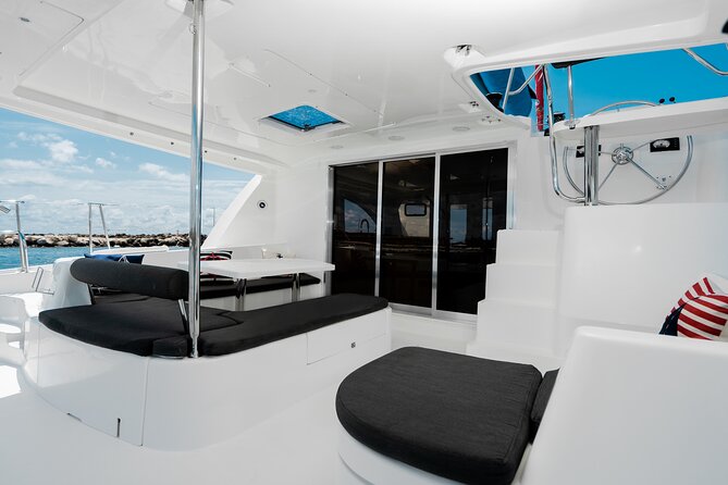 8-Hour Private 44 Leopard Catamaran Tour to Cozumel Beach W/Food & Open Bar - Departure and Transportation