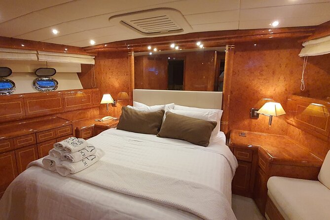 8 Hour Private Yacht Cruise in Delos Rhenia Mykonos Mangusta 72 - Sample Itinerary