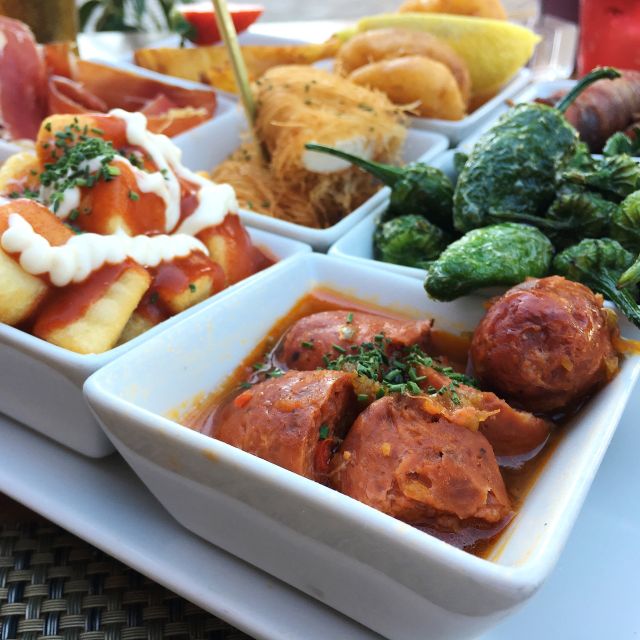 A Coruña: Galician Tapas Walking Tour to La Pescadería - Key Points