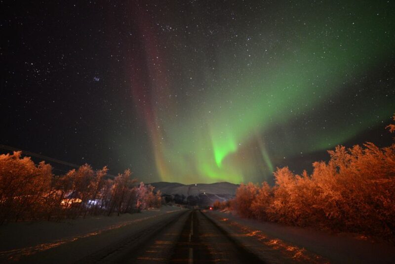 Abisko: Guided Aurora Chase With Hotel Transfers - Scenic Reflections