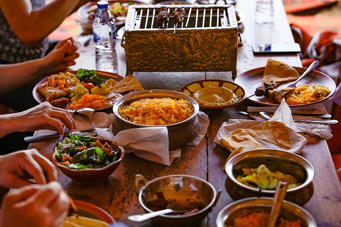 Abu Dhabi: 7-Hours Desert Safari With Bbq, Camel Ride & Sandboarding - Henna Art Exploration