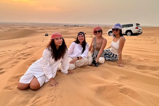 Abu Dhabi Evening Desert Safari Tour With Shows and BBQ Dinner - Meeting and Pickup