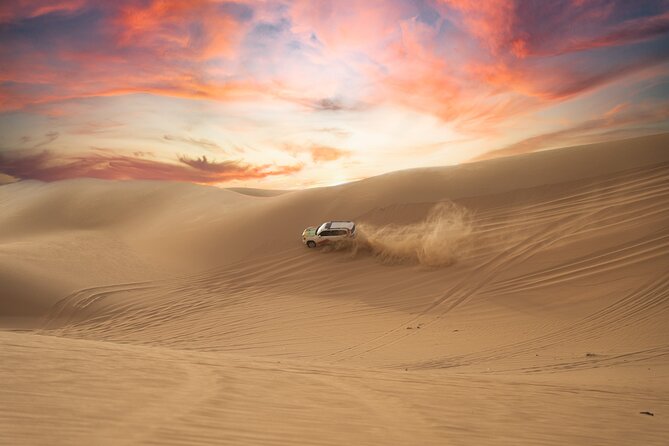 Abu Dhabi Morning Desert Safari: 4x4 Dune Bashing, Camel Ride and Sandboarding - Camelback Riding Delight