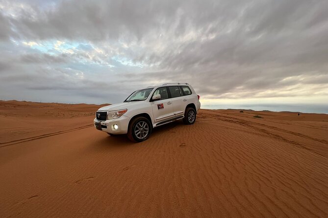 Abu Dhabi Morning Desert Safari - Private Car - Sandboarding Down the Dunes