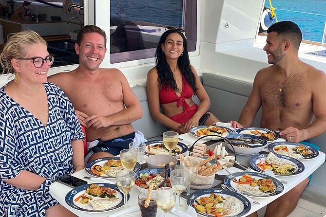 Agios Nikolaos Evening Catamaran Cruise in Mirabello With Dinner - Booking and Cancellation