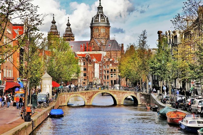 Airport Transfer: Schiphol Airport AMS to Amsterdam by Luxury Van - Pickup and Drop-off
