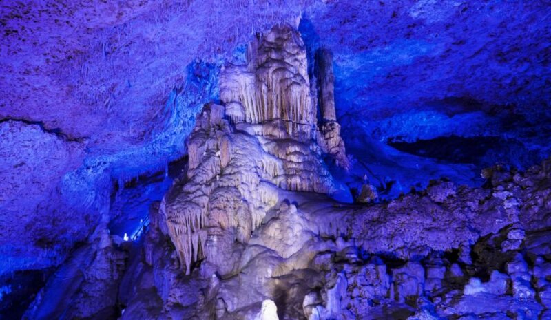 Alcudia: Half-Day Caves of Hams, Blue Caves and Documentary - Itinerary and Transportation