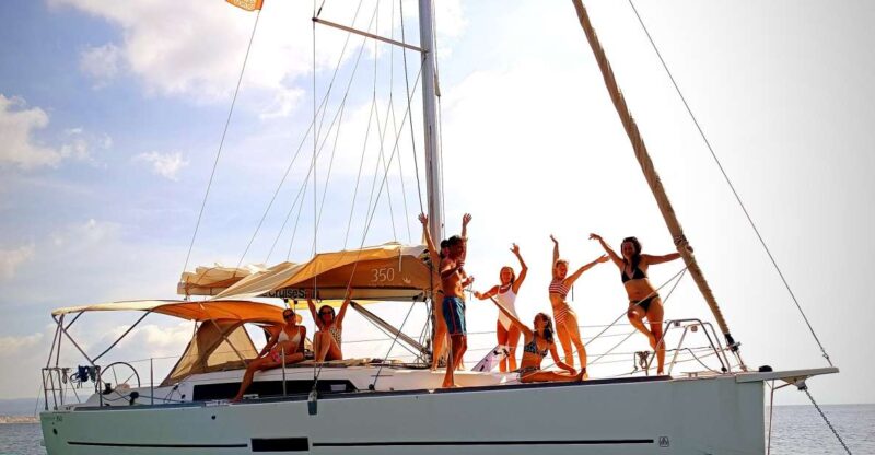 Alghero: Daily Sailing Experience With Lunch Onboard - Onboard Amenities and Activities