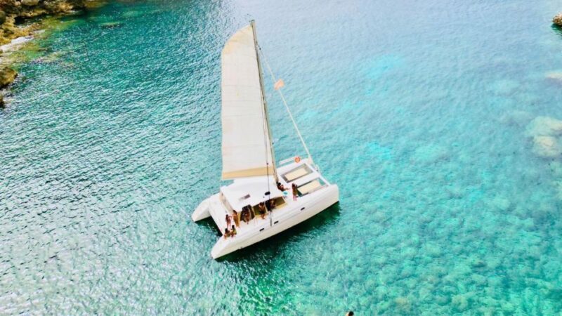 Alghero: Full Day on a Catamaran in Porto Conte Natural Park - Key Points