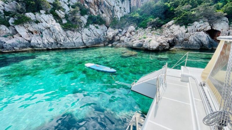 Alghero: Full Day on a Catamaran in Porto Conte Natural Park - Meeting Point and Accessibility
