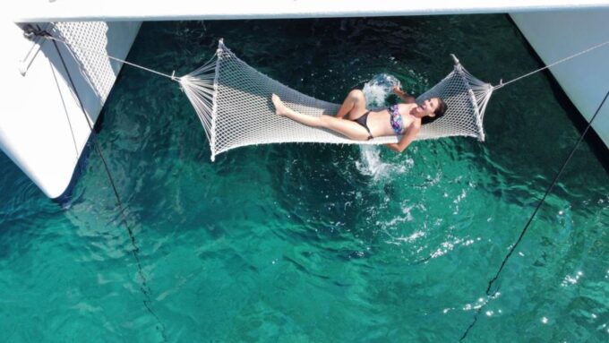 Alghero: Full Day on a Catamaran in Porto Conte Natural Park - Cancellation and Payment Options