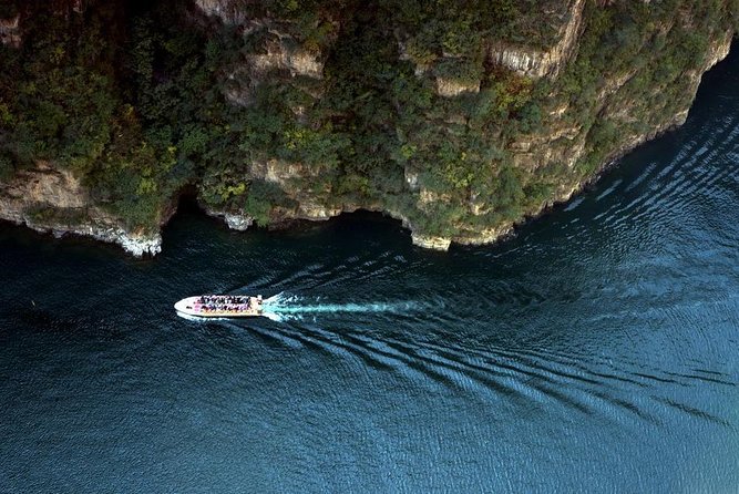 All-Inclusive Private Day Tour to Longqing Gorge and Guyaju Caves - Meeting and Pickup