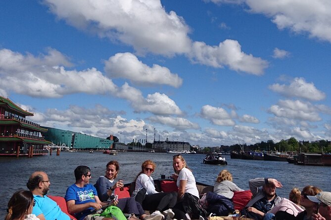 Amsterdam 1-Hour Canal Cruise With Live Guide - Inclusions and Amenities