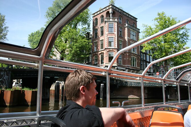 Amsterdam 1-Hour Sightseeing Canal Cruise by Semi-Open Boat - Highlights of the Experience