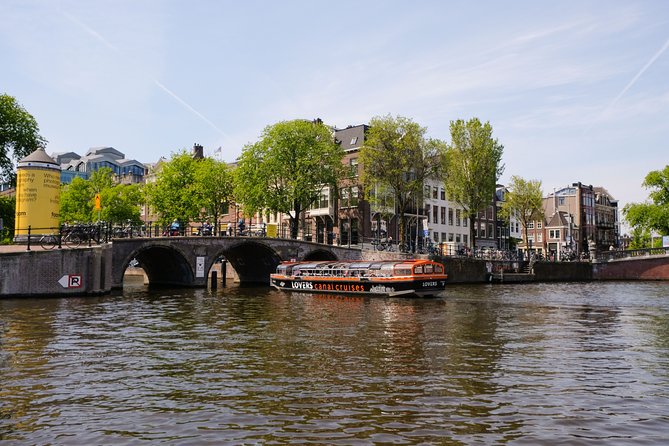 Amsterdam 1-Hour Sightseeing Canal Cruise by Semi-Open Boat - Whats Included in the Cruise