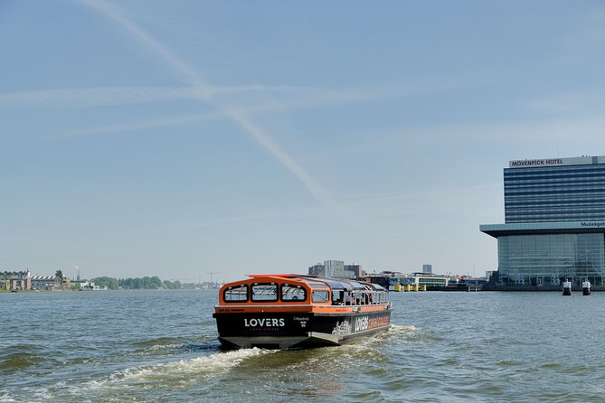 Amsterdam 1-Hour Sightseeing Canal Cruise by Semi-Open Boat - Accessibility and Limitations