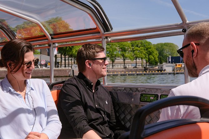 Amsterdam 1-Hour Sightseeing Canal Cruise by Semi-Open Boat - Booking and Cancellation Policy
