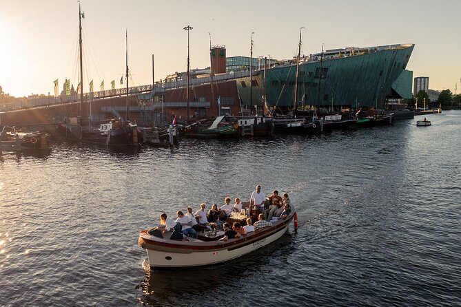 Amsterdam 2-Hour Canal Cruise Including Drinks & Dutch Snacks - Duration and Highlights