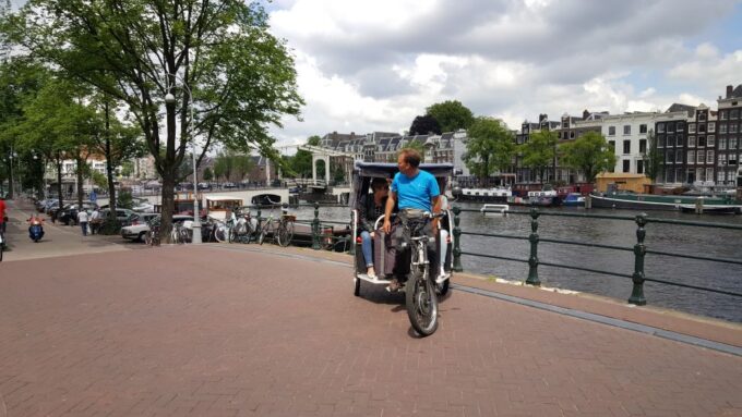 Amsterdam: 2-Hour Sightseeing Tour by Rickshaw - Exploring Amsterdams Historic Center