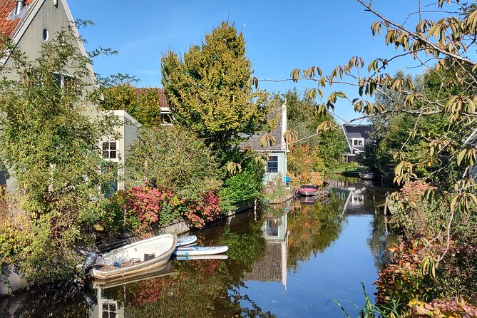 Amsterdam and Countryside Private Full-Day Tour by Luxury Car - Luxury Car and Amenities Provided