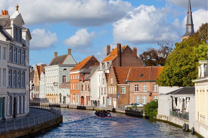 Amsterdam: Bruges Full Day Guided Tour From Amsterdam - Meeting Point and Start Time