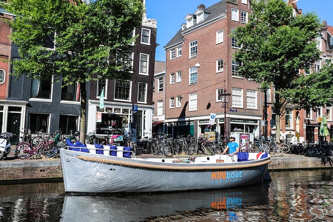 Amsterdam Canal Cruise in Open Boat With Local Skipper-Guide - Onboard Drinks