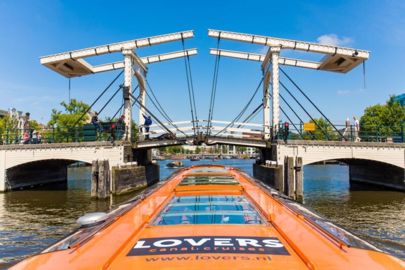 Amsterdam: City Canal Cruise and Heineken Experience - Language and Audio Guide