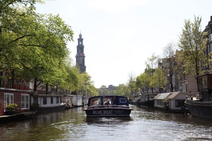 Amsterdam: City Canal Cruise With Audio Guide - Included Amenities and Extras