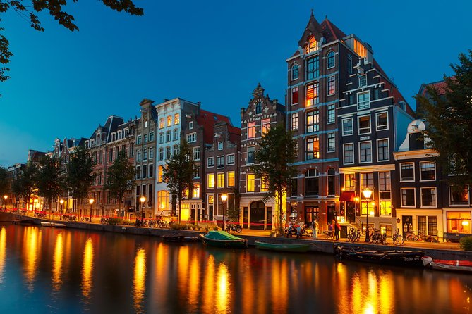 Amsterdam Evening Canal Cruise With Live Guide and Onboard Bar - Tour Description and Commentary