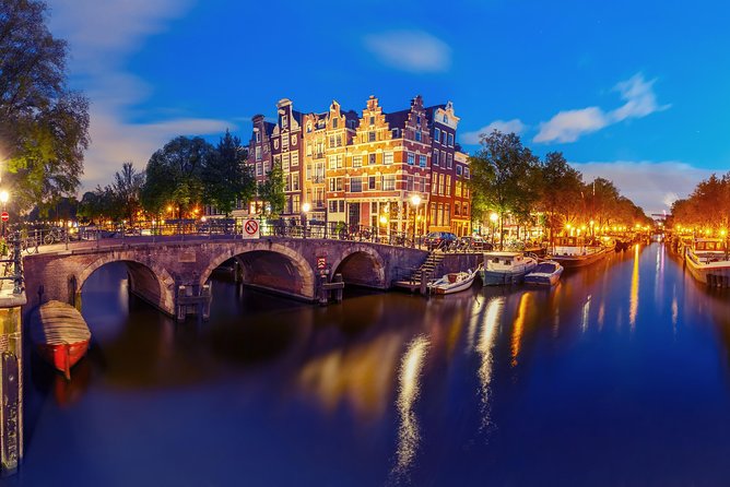 Amsterdam Evening Canal Cruise With Live Guide and Onboard Bar - Boat and Group Details