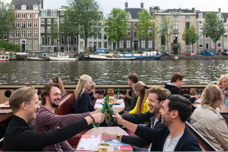 Amsterdam: Evening Canal Cruise With Pizza and Drinks - Key Points