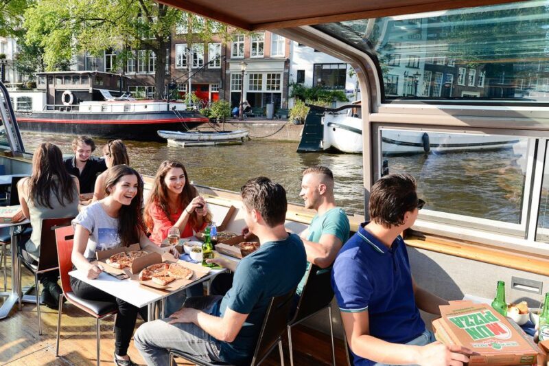 Amsterdam: Evening Canal Cruise With Pizza and Drinks - Experience Highlights