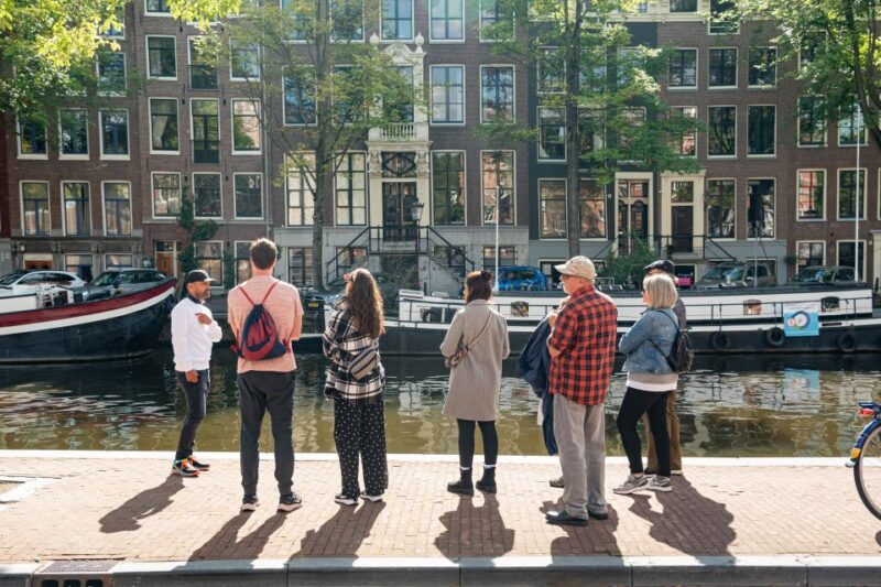 Amsterdam: Highlights & History Walking Tour - Guided Experience