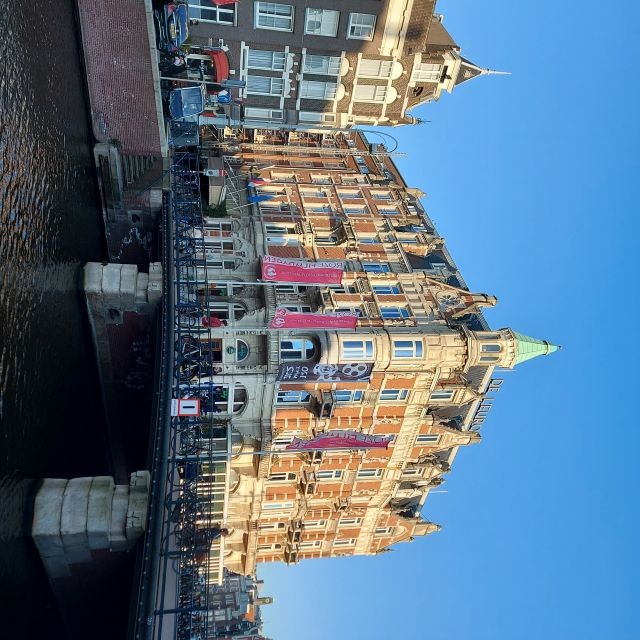 Amsterdam: Layover Sightseeing Tour With Airport Transfer - Explore Hidden Gems and History