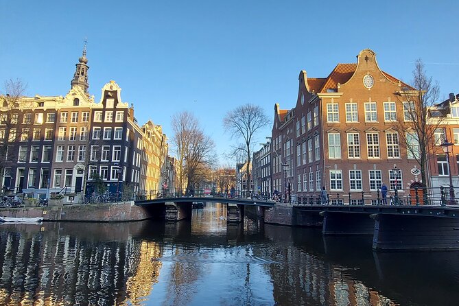 Amsterdam Layover: Walking Tour, Canal Cruise Incl. Transfer - Discover Amsterdams Culture