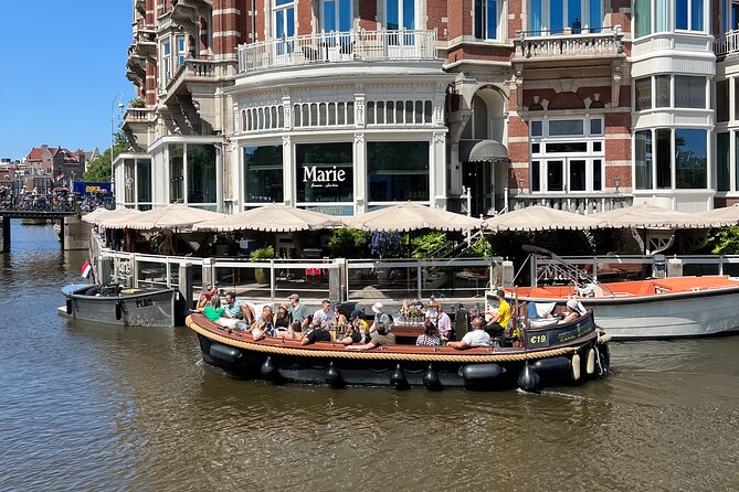 Amsterdam Luxury Boutique Boat Tour With Unlimited Beer and Wine - Amenities Offered