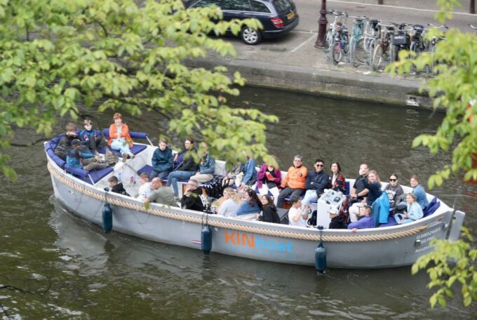 Amsterdam: Open Boat Canal Cruise With Local Guide - Sustainable and Electric Boat Experience