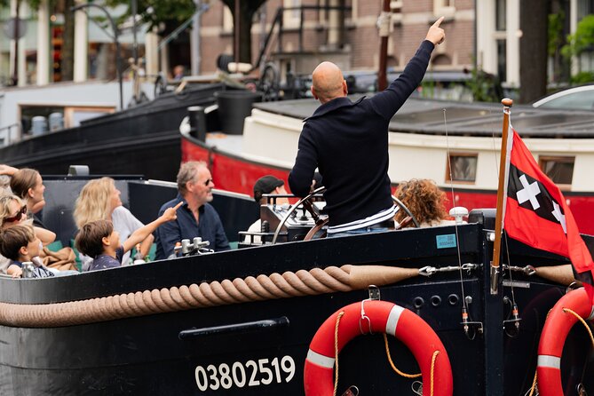 Amsterdam Open Boat Evening Canal Tour Local Guide and Open Bar - Key Points